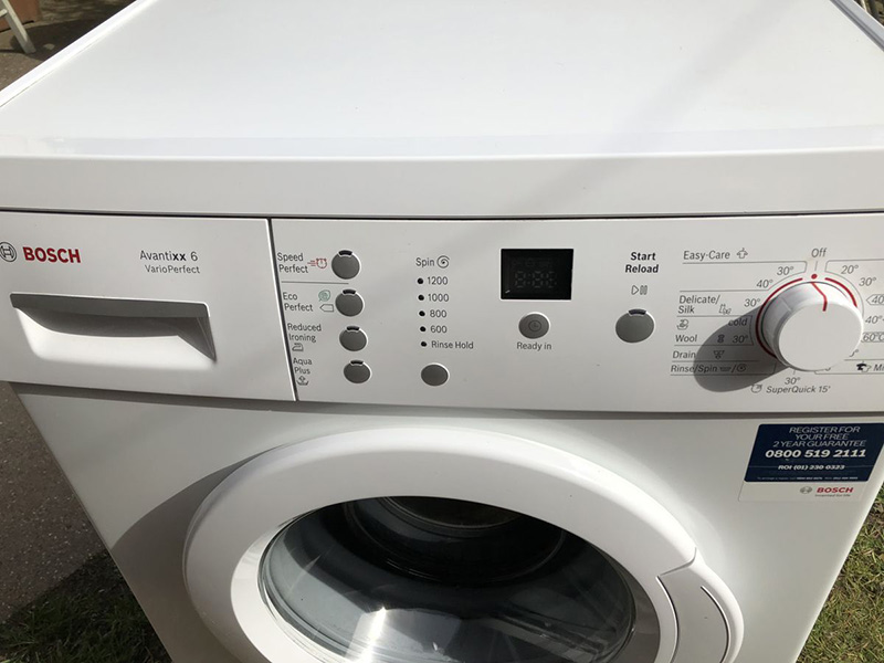 علامت‌های روی ماشین لباسشویی بوش